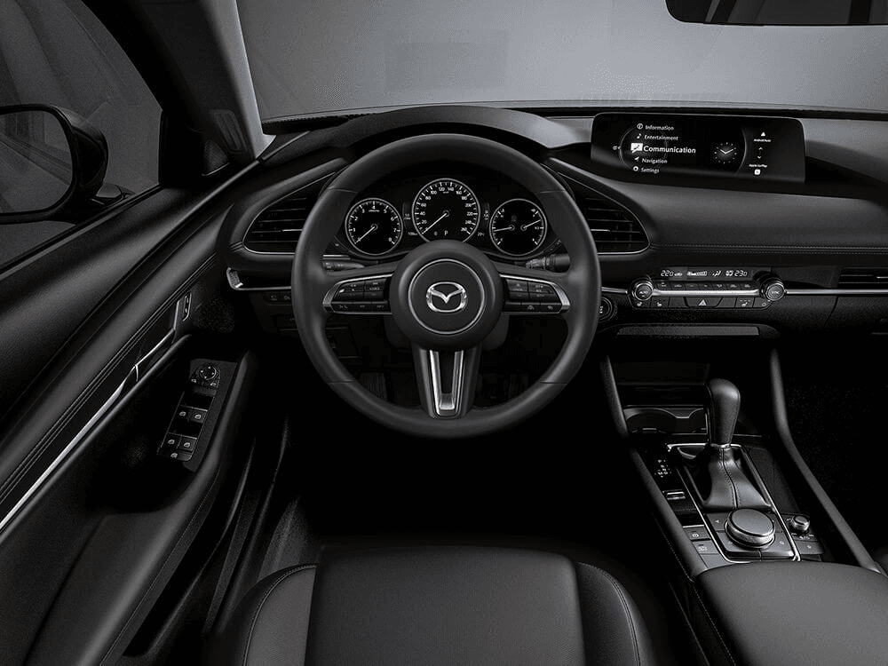 ensemble complet de technologies Mazda au volant de la Mazda3 Sport 2025.